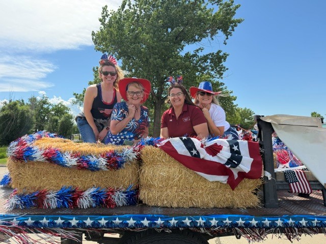 Bank of Baker 4th of July Parade Float, 2026. Employees pose for a picture