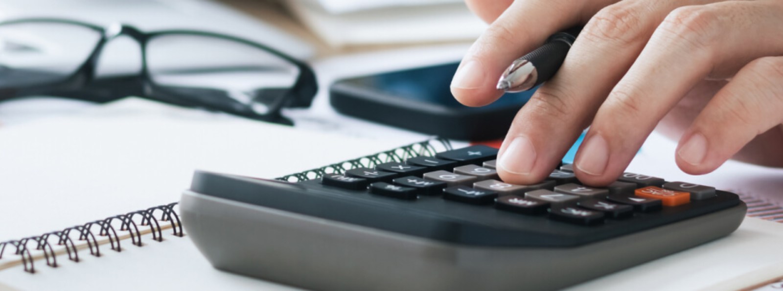 a person working on a calculator